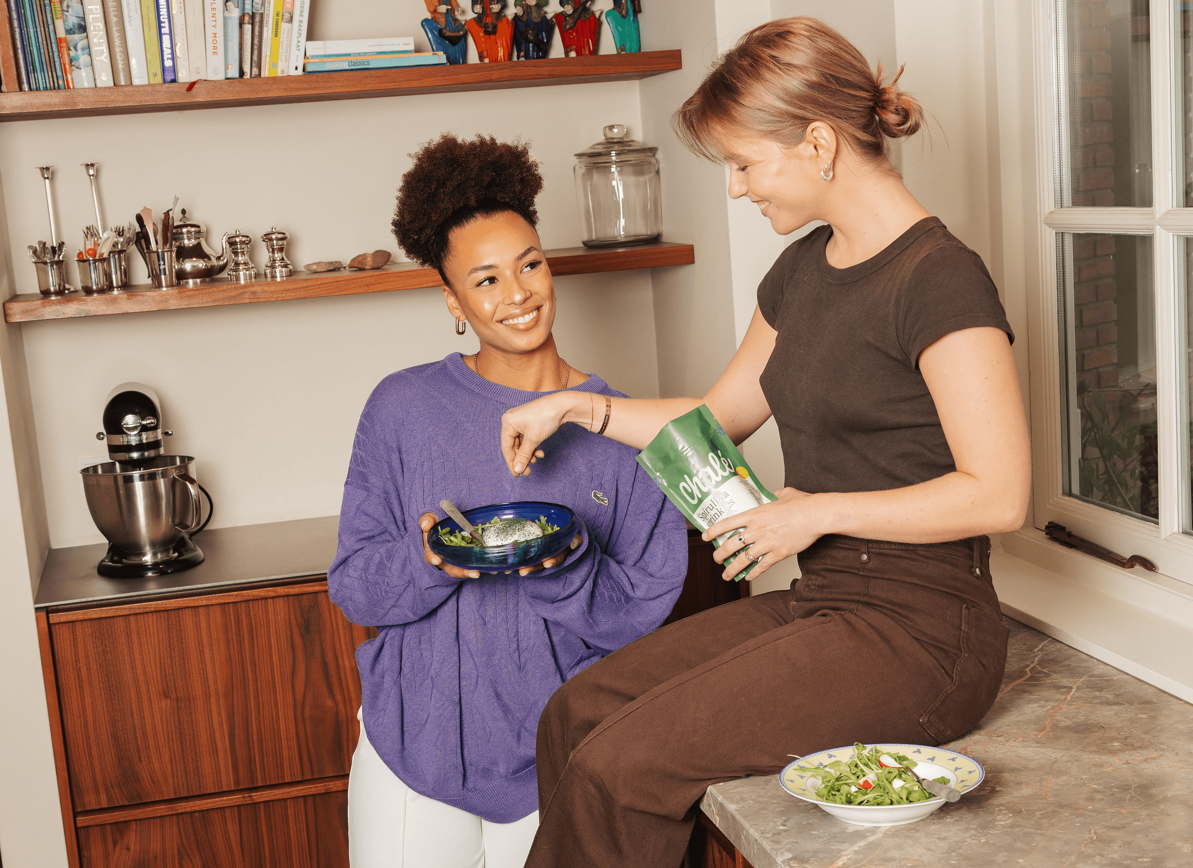Mixing spirulina sprinkles into a blender