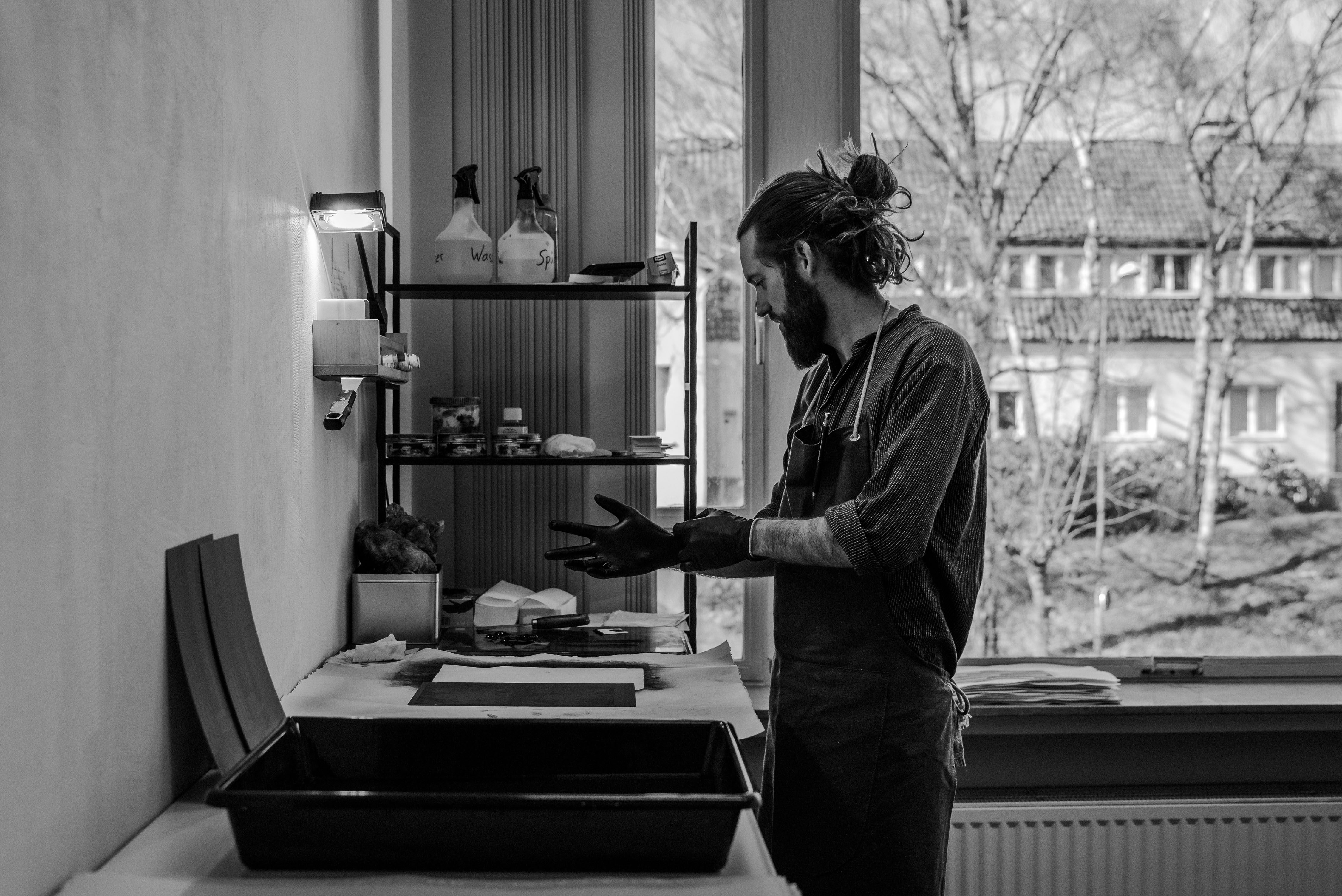 Man preparing for photogravure printing process