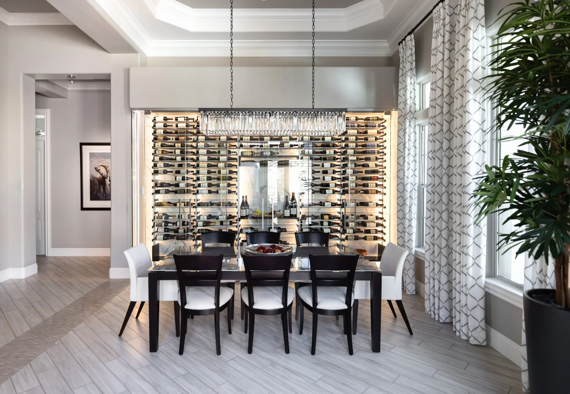 nfinity pool blending into the ocean view, minimalist sun loungers in soft neutral fabric, curved architecture