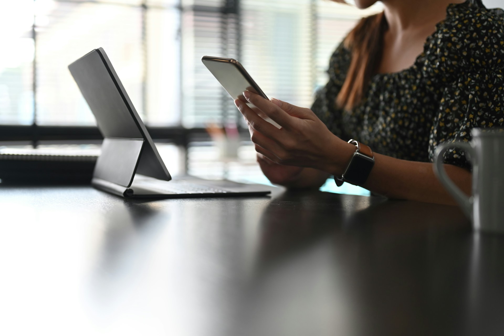 A woman holding her phone