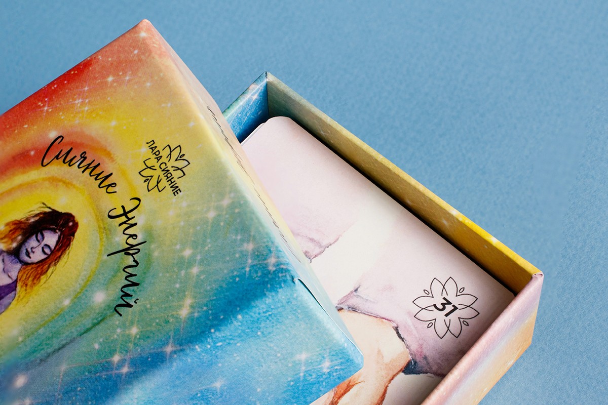 Rigid boxes, card decks, boxes, packaging for "Radiance of Energies" printed on coated paper, coated board, binding board with mounting to board, digital printing.