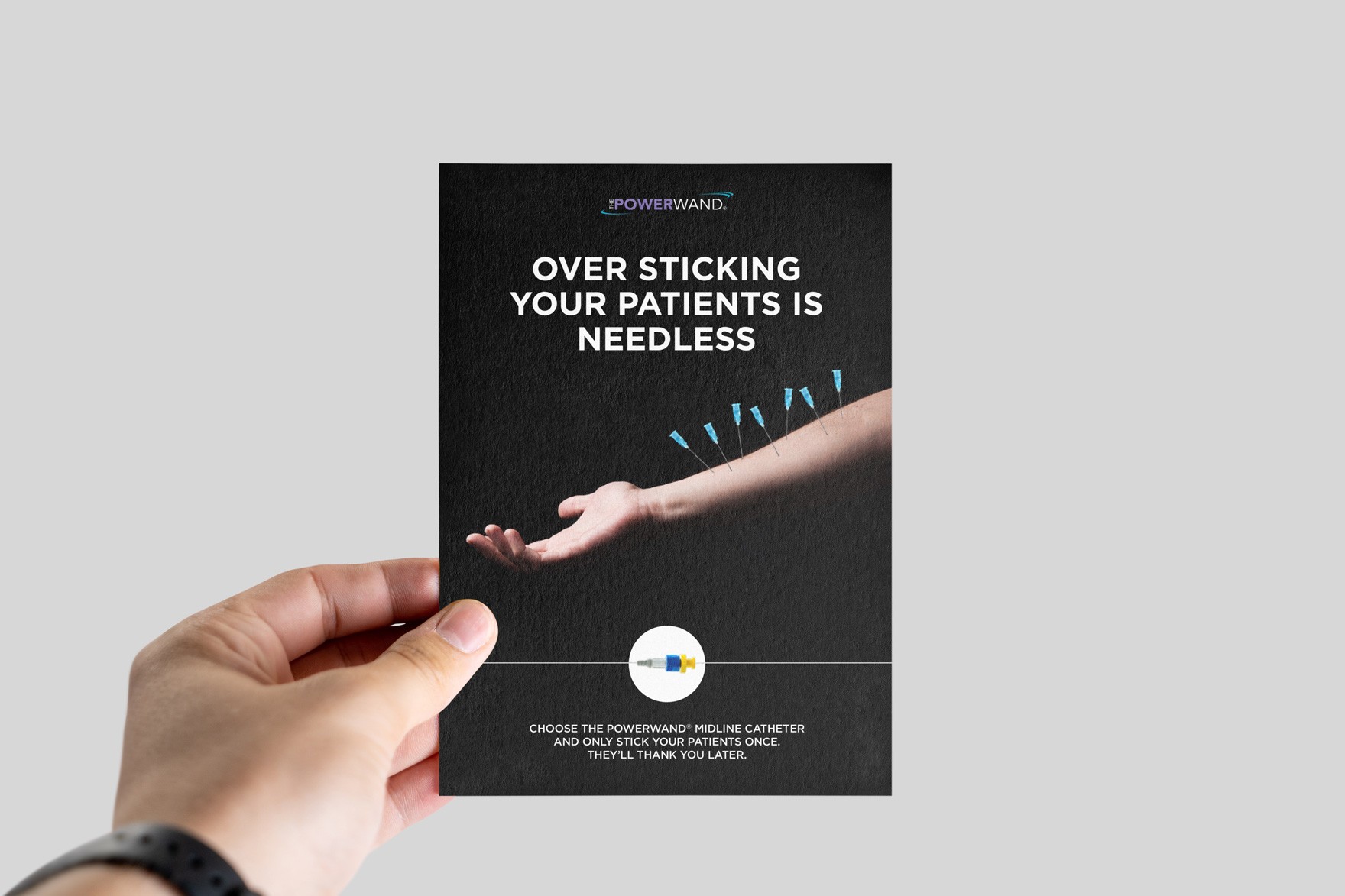 A person holding a leaflet raising awareness and product promotion. The headline reads “Over sticking your patients is needless”