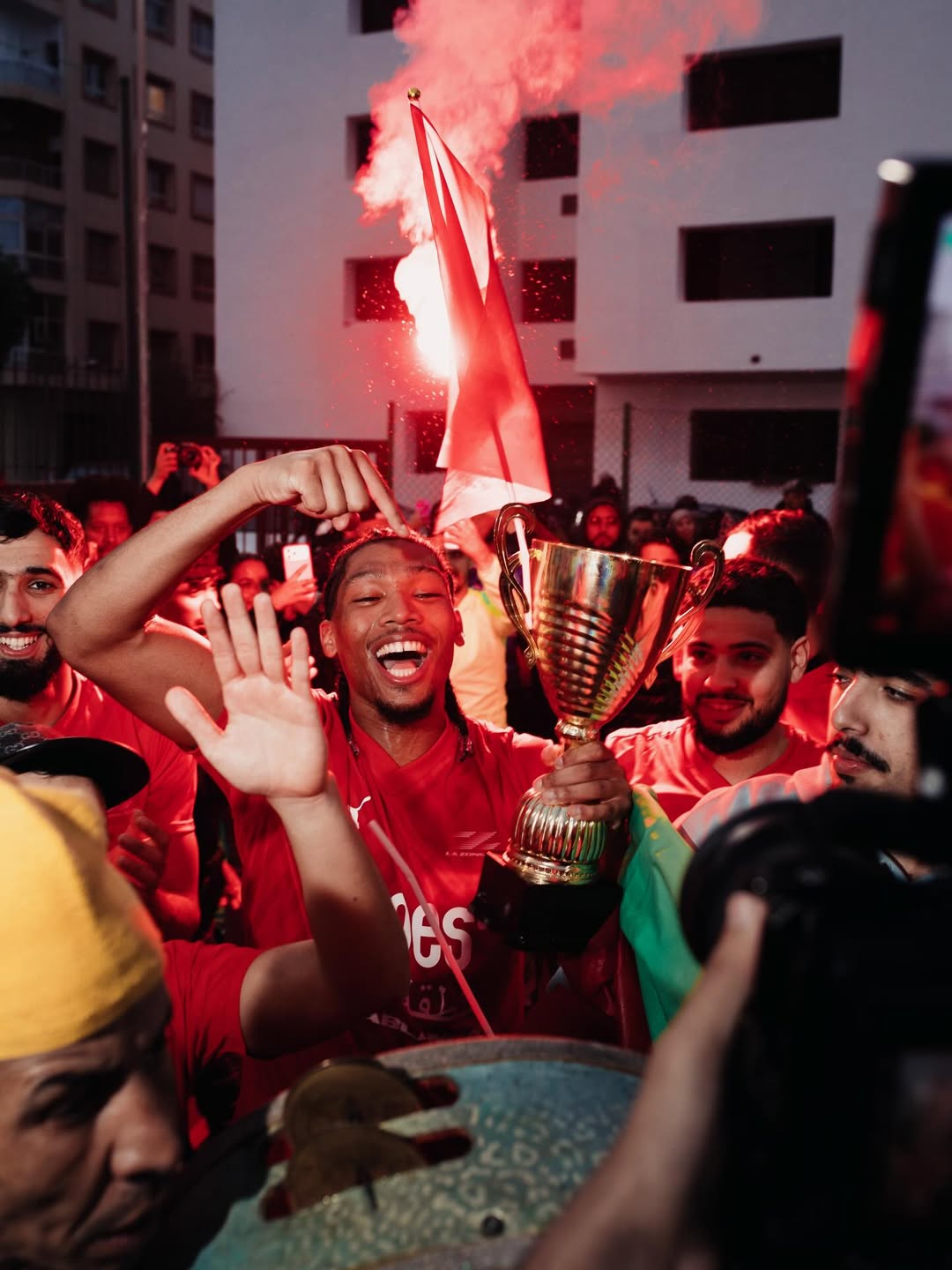 Streetside billboard with flyposters of the Batch.Works brand and illustrations