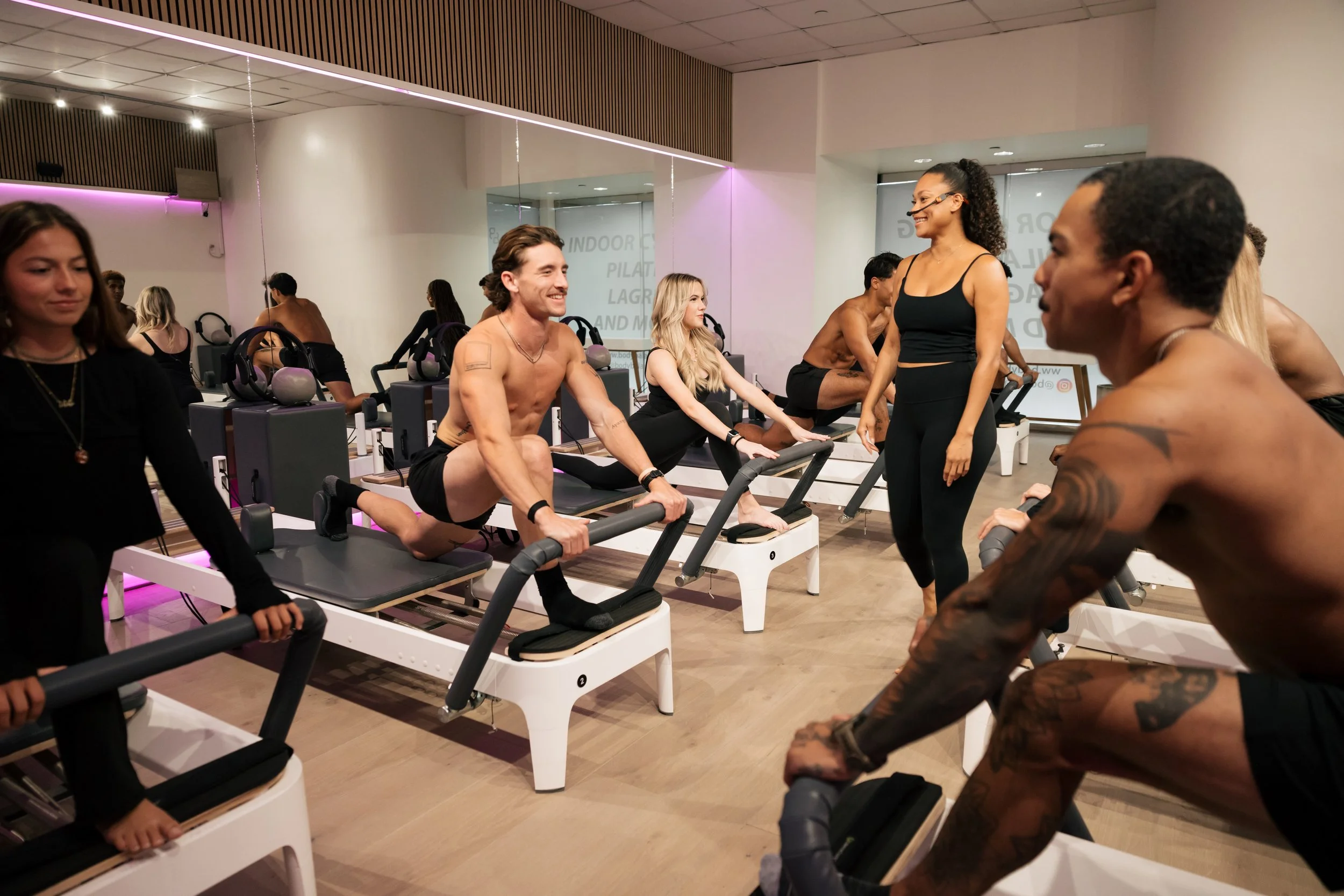 Body Balance Hawaiʻi fitness instructors moving together in the studio