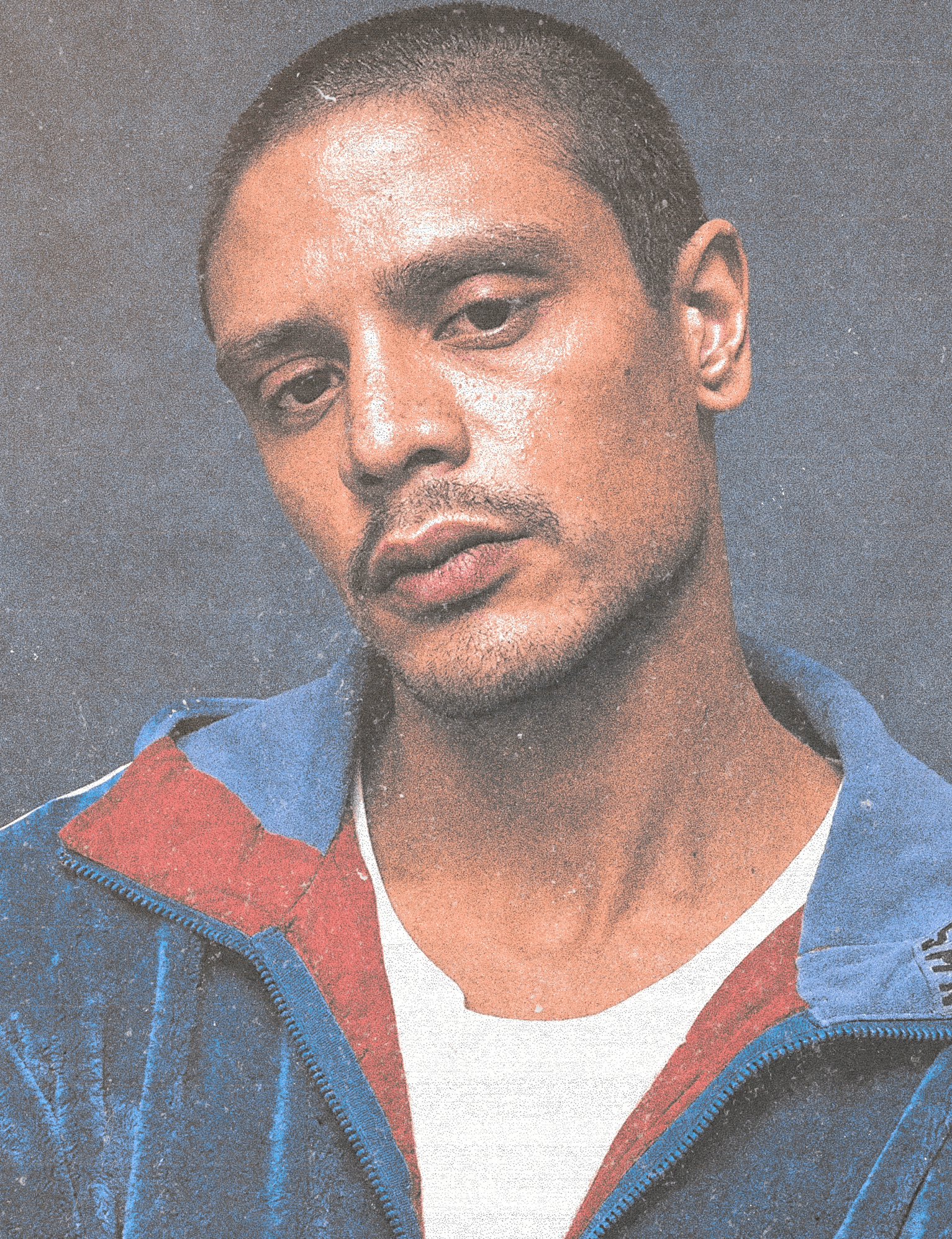 Man smelling a small toy car outdoors