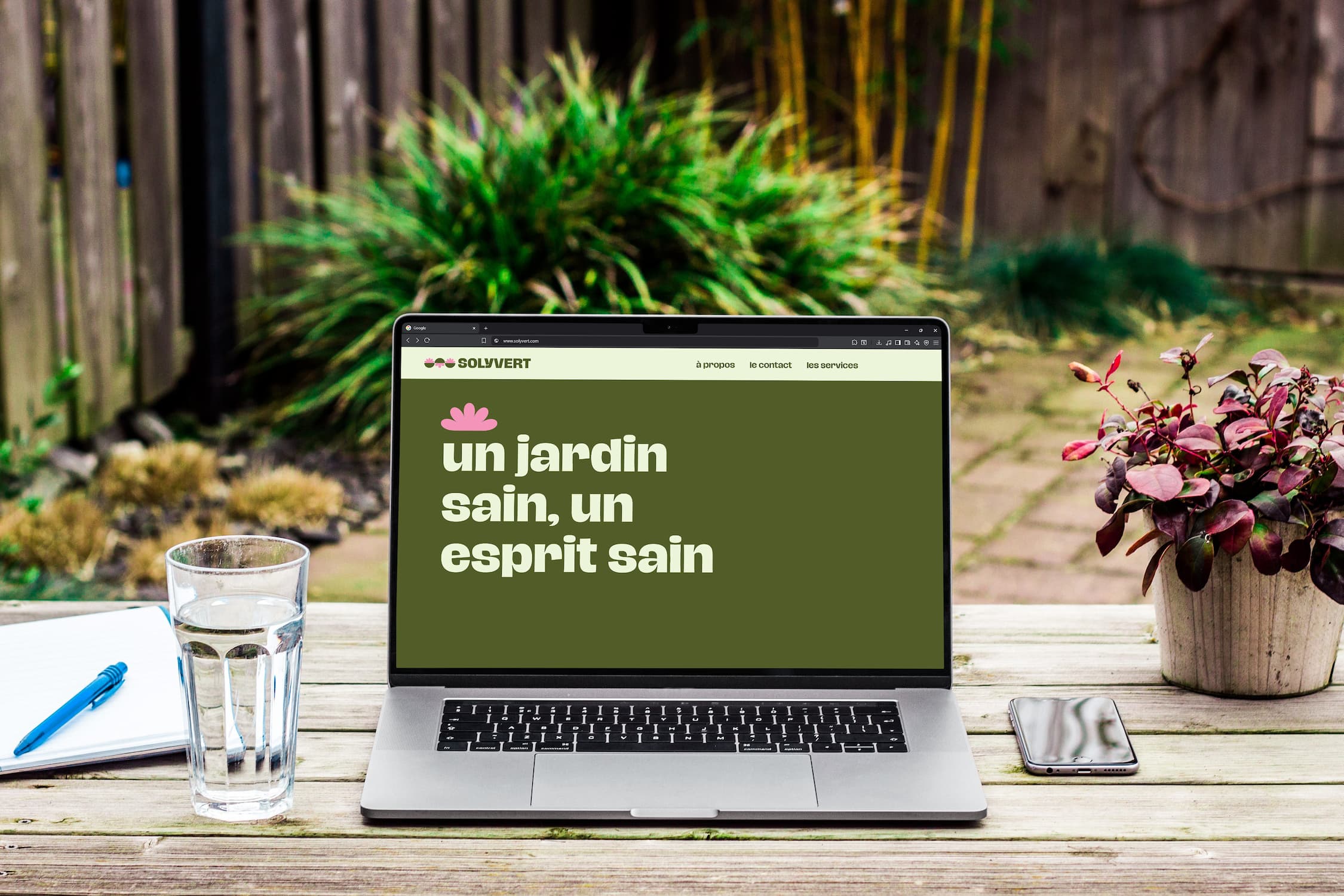 Solyvert Gardening website displayed on a computer screen, set against a garden background to reflect the brand’s gardening focus.