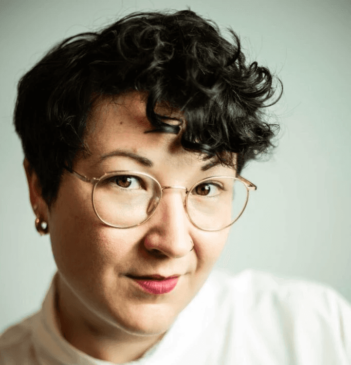 female photographer with red hair