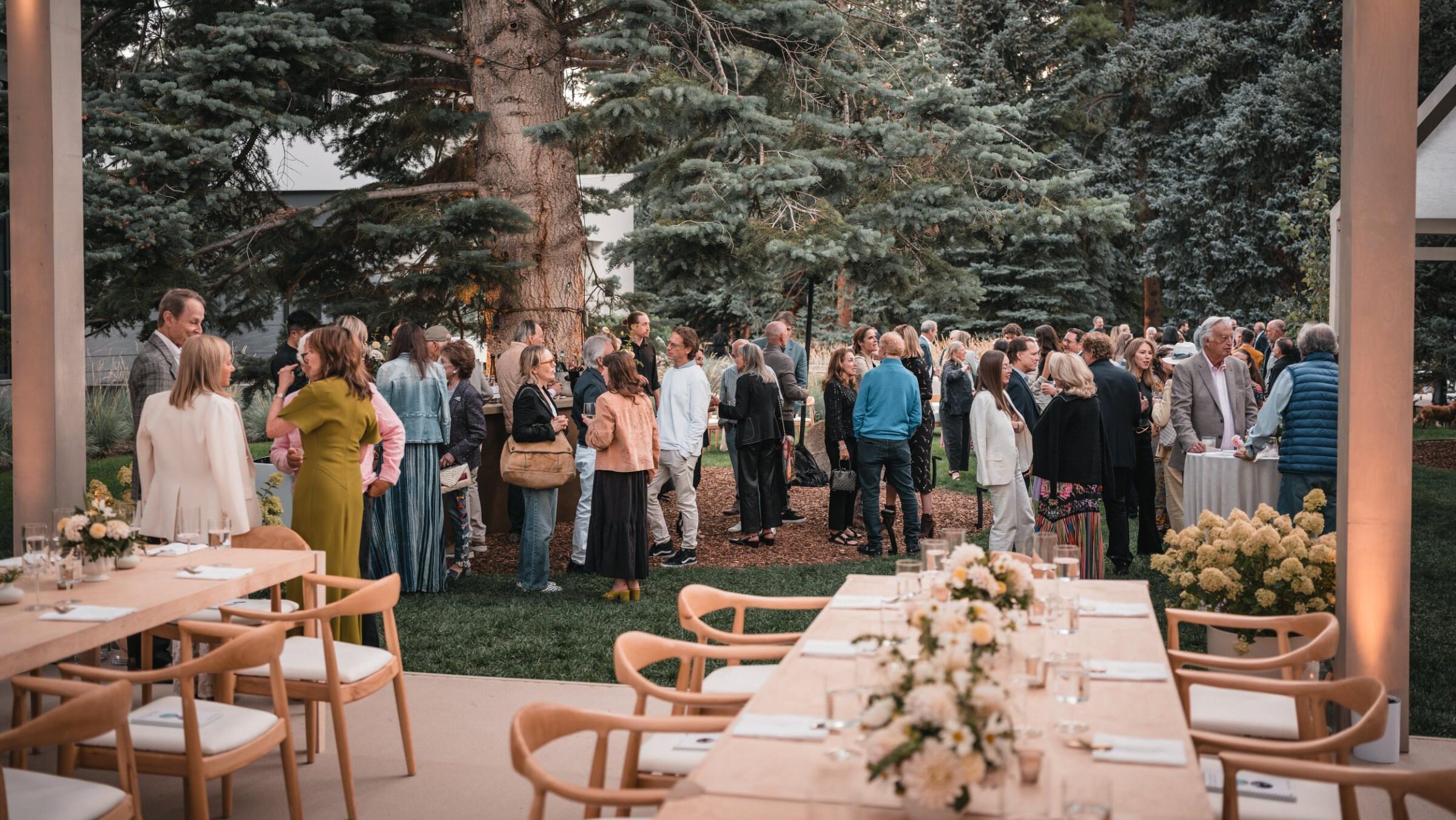 Guests connecting during an evening reception at a multi day corporate retreat