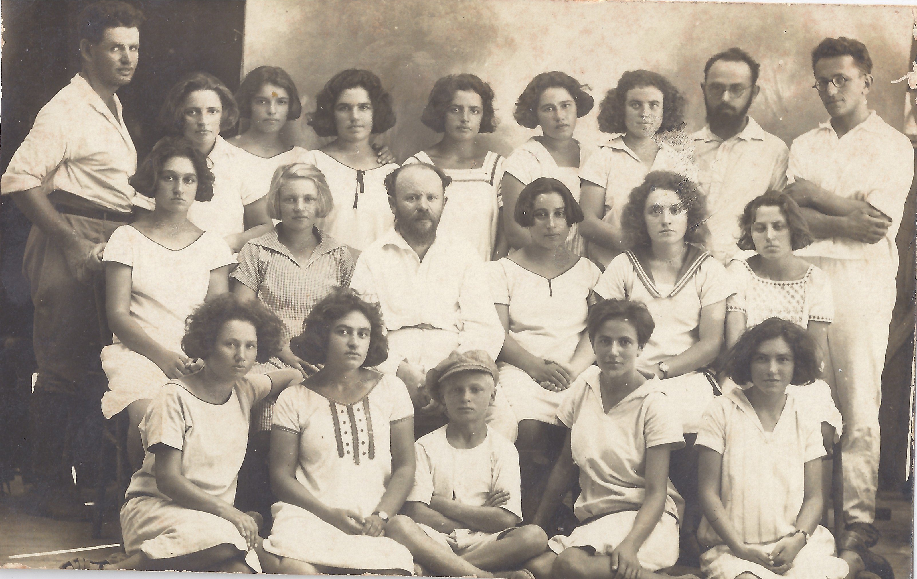A group photo of girls and teachers at the Children's Village, including the teacher Pugachev