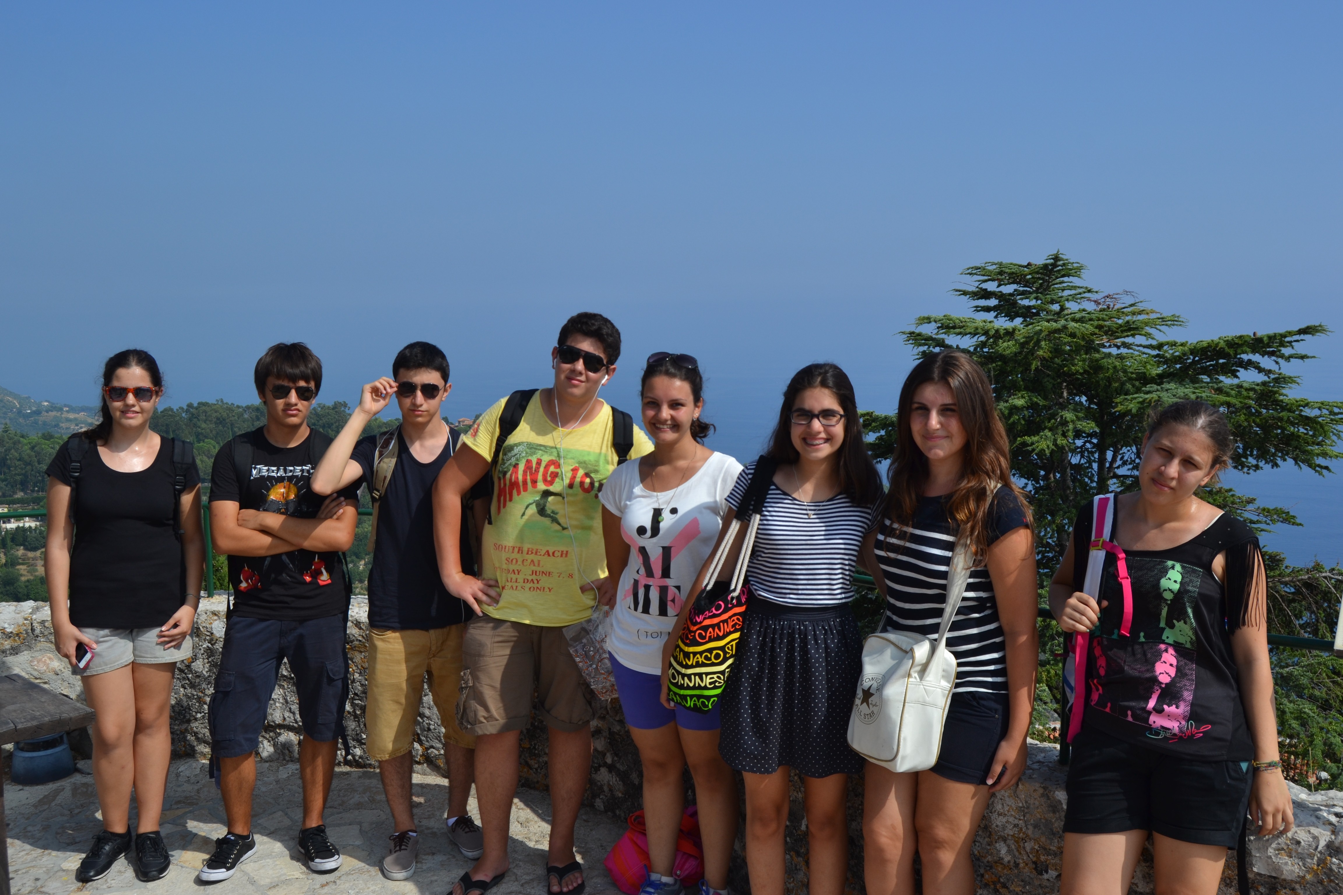 a group of people standing in front of a building