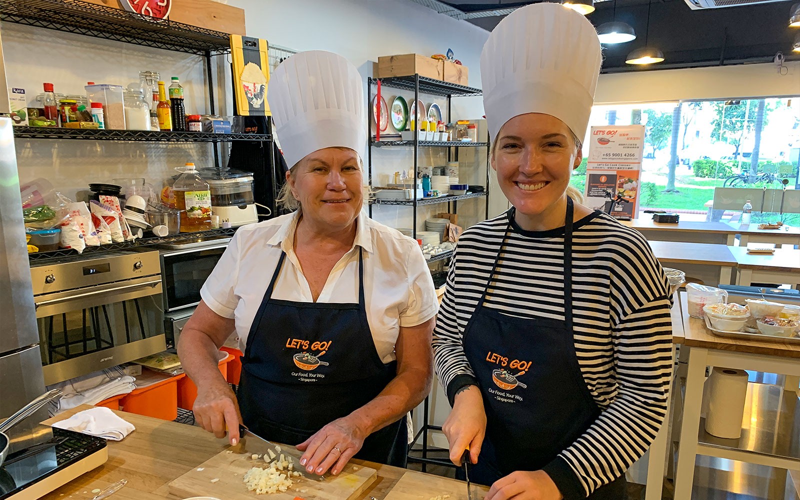 Singapore culinary tour with local market visit and cooking class experience.
