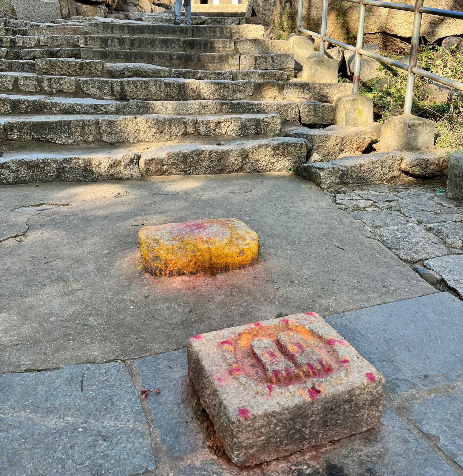 Eknatheshwari's feet scuplted in stone on the way to the top in Chitradurga fort