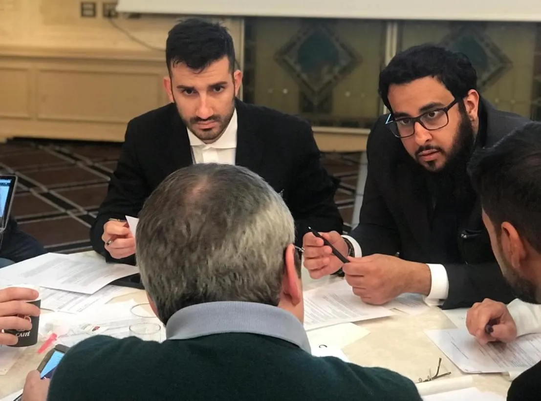 Participants working through cases at an EQuIP workshop