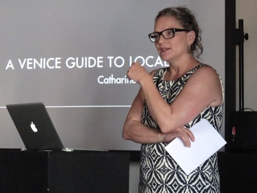 woman with a glasses giving powerpoint presentation