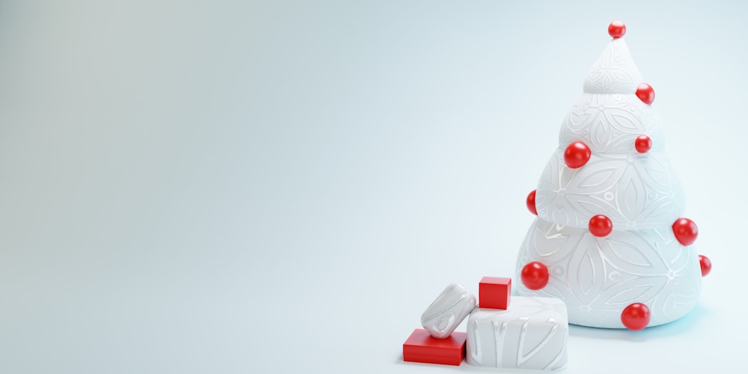 a white christmas tree with red and white decorations