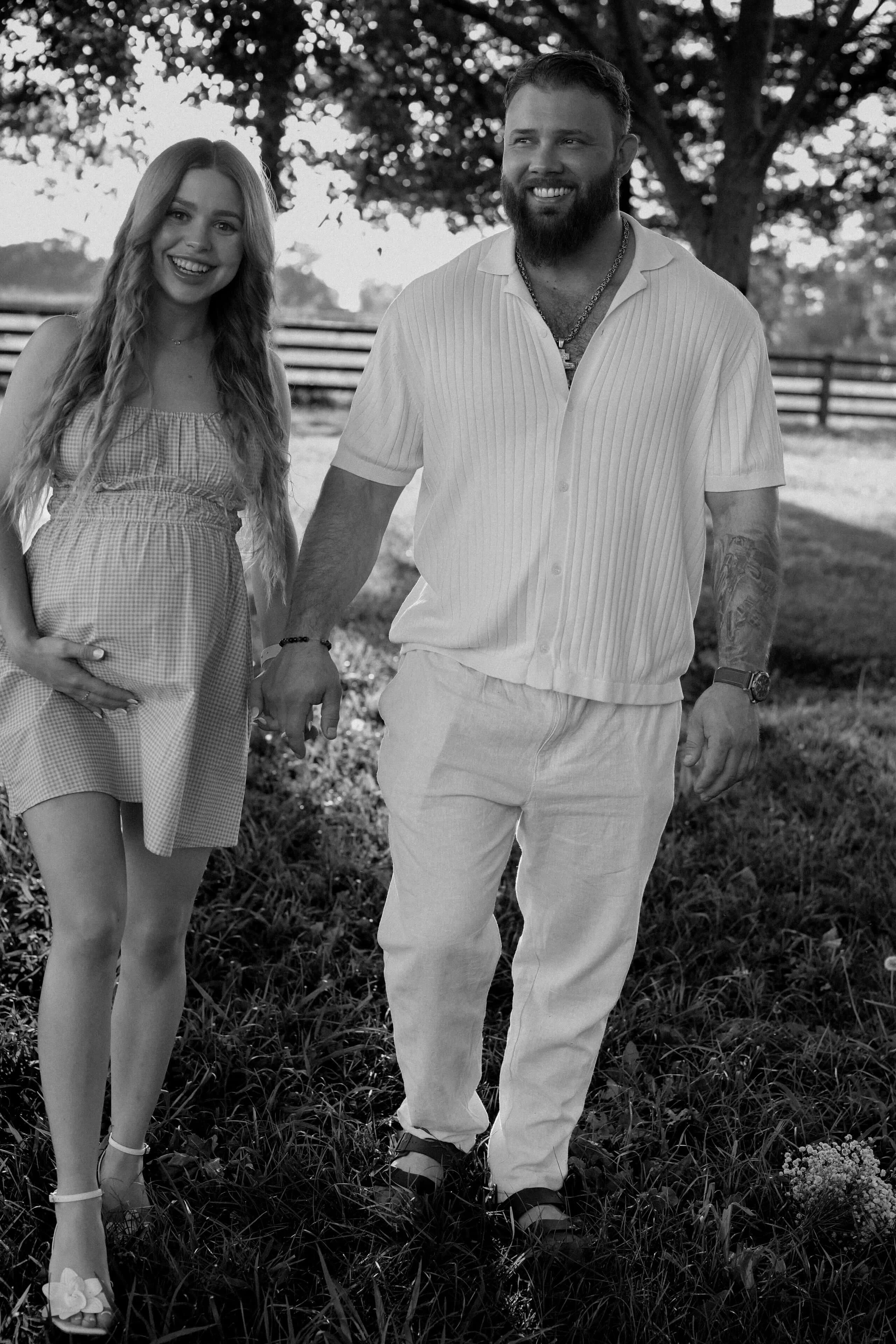 Couple in contemporary outfits walking together through a downtown Sacramento street