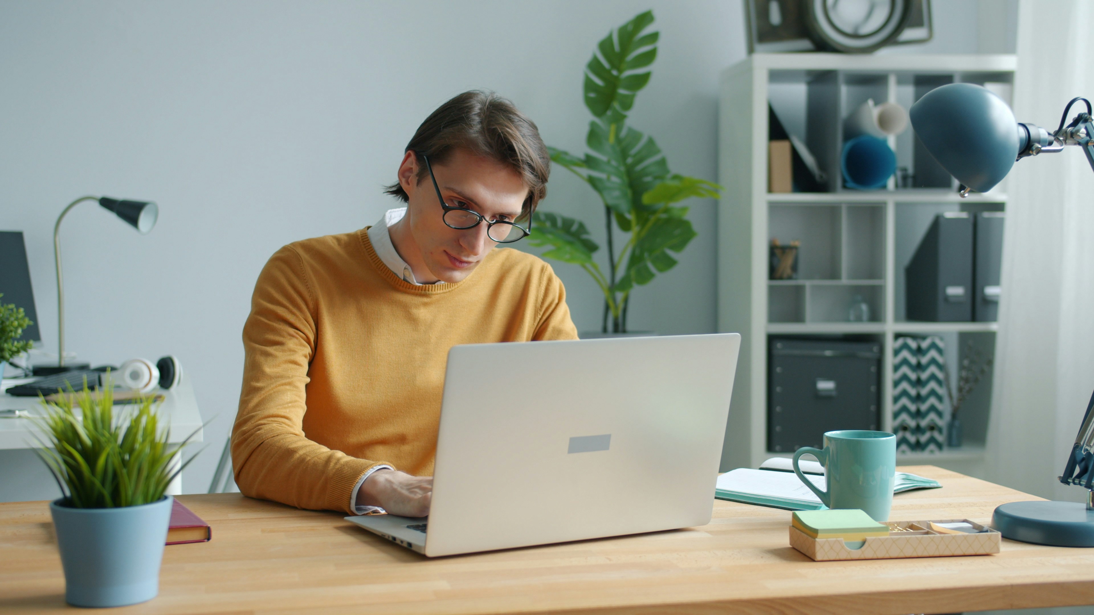 man working on laptop - How to Automate Data Entry in Excel
