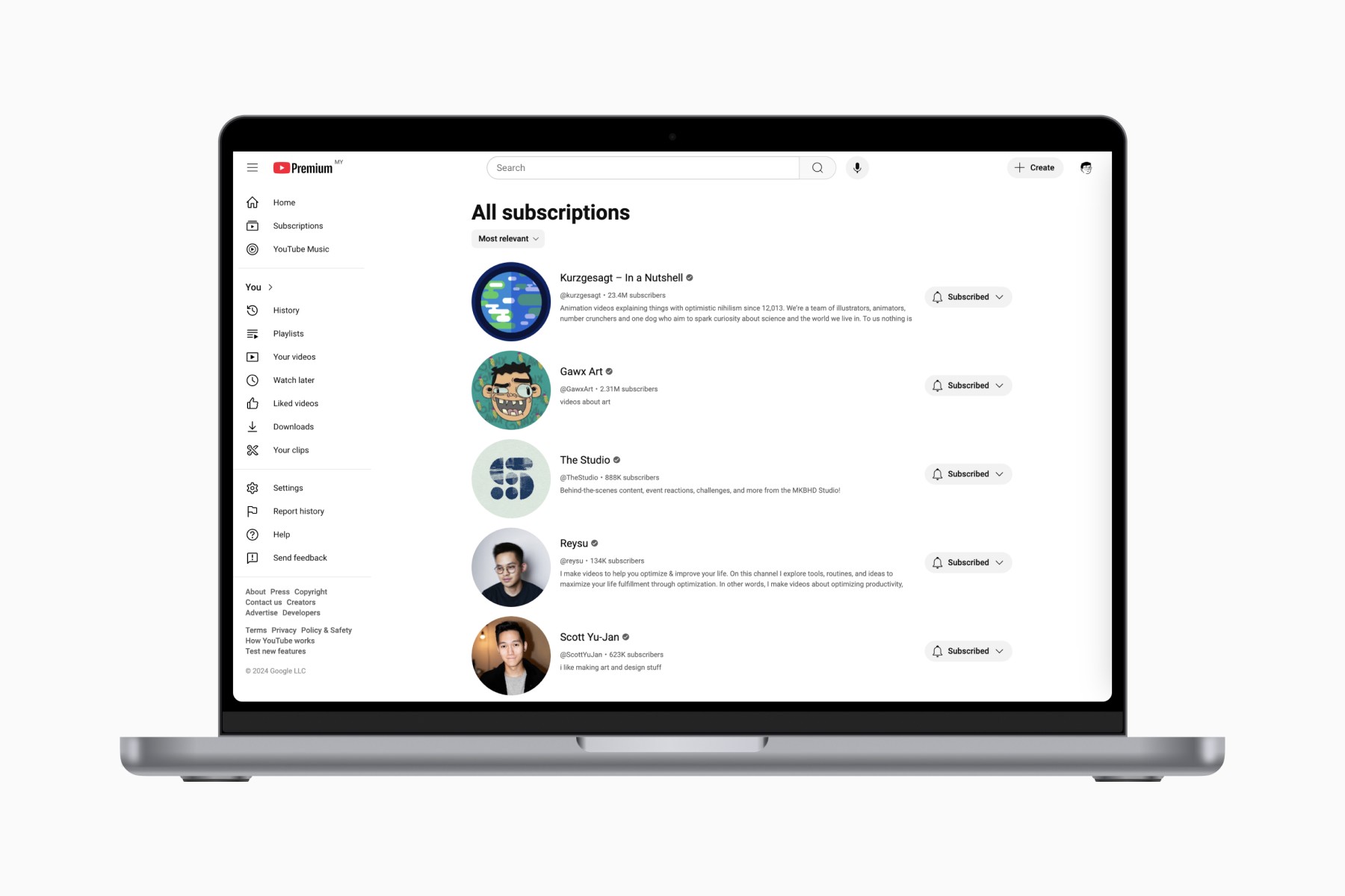 YouTube subscriptions page on MacBook