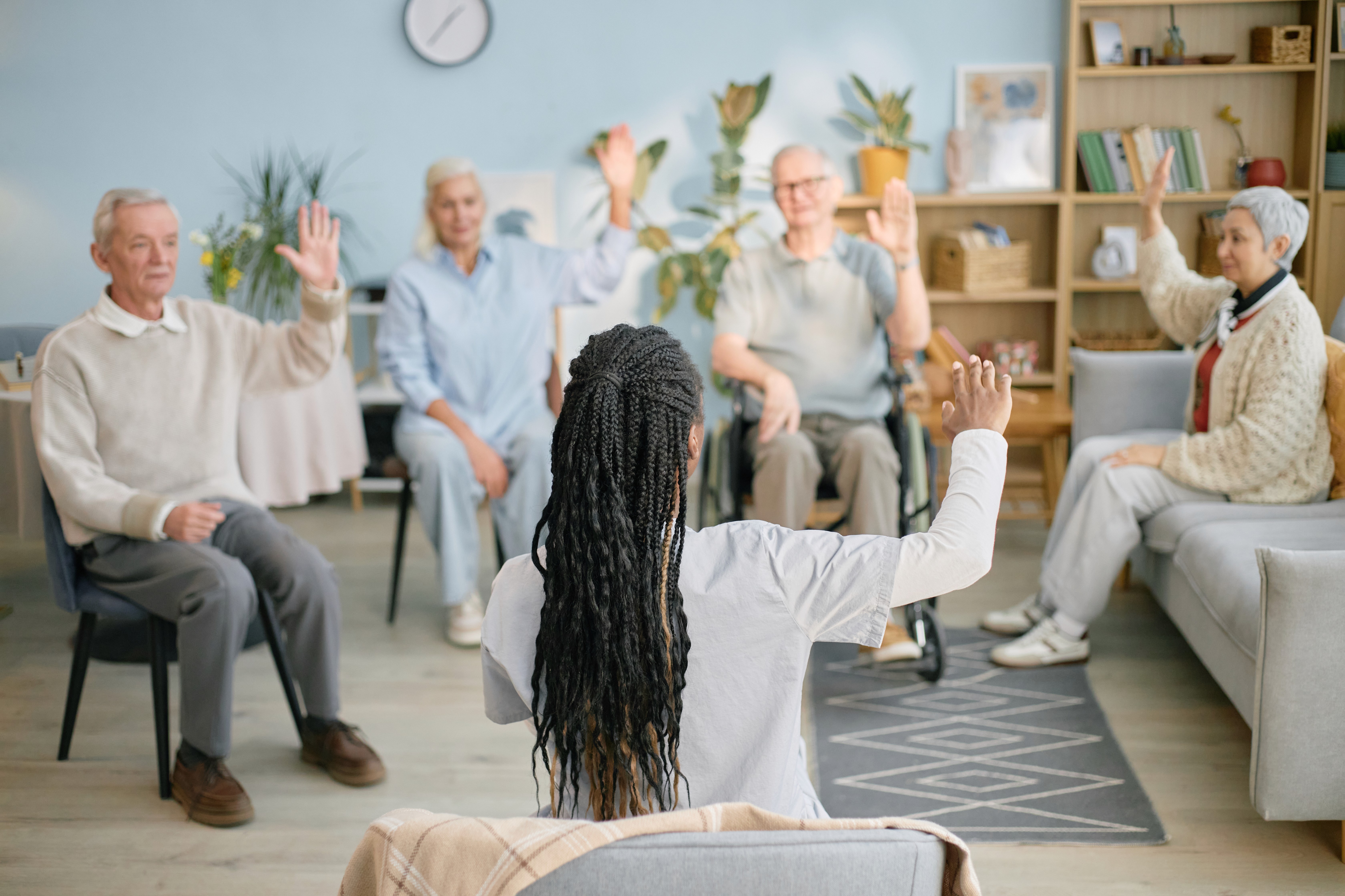Participating in Senior Group Therapy Session Indoors