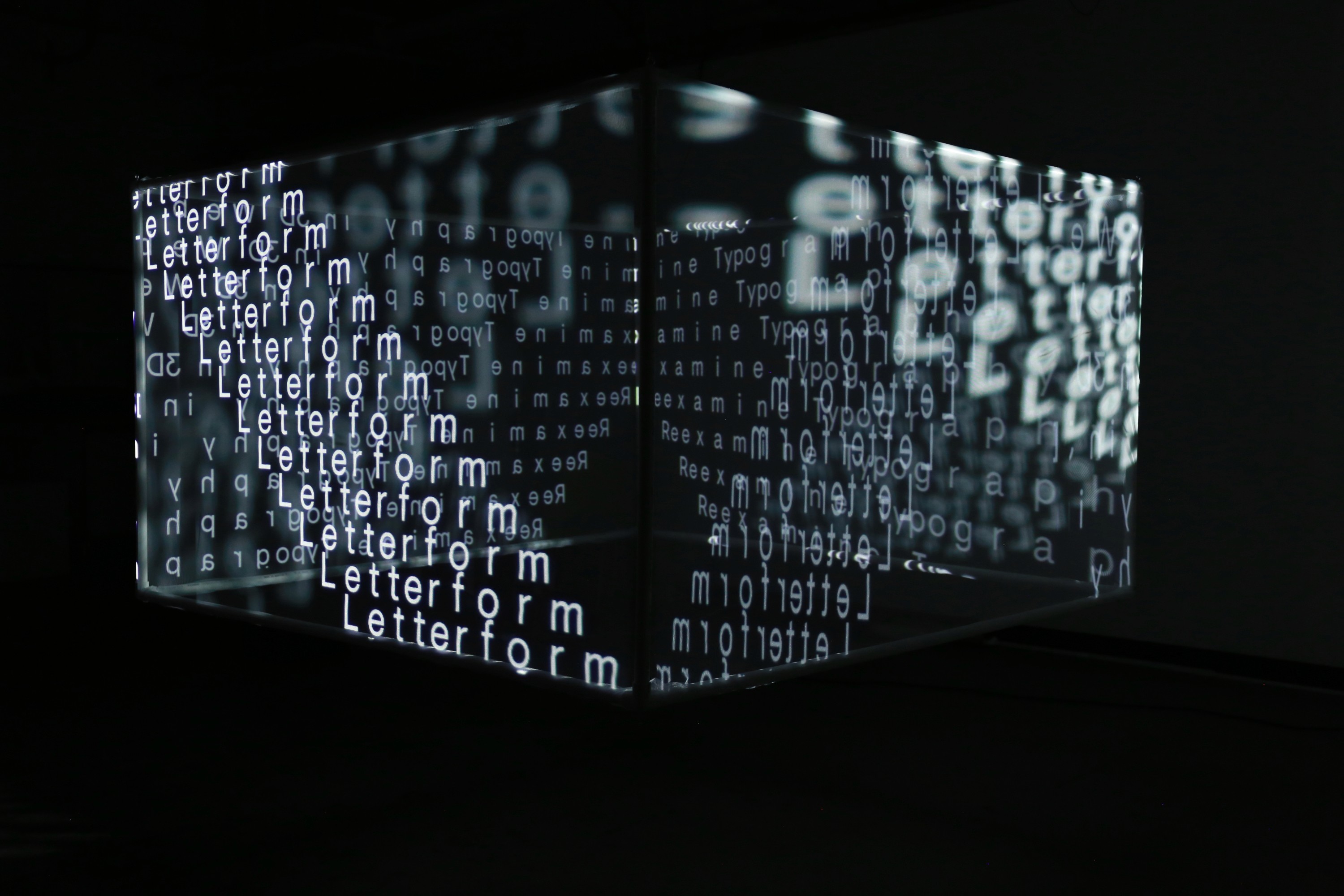 Streetside billboard with flyposters of the Batch.Works brand and illustrations