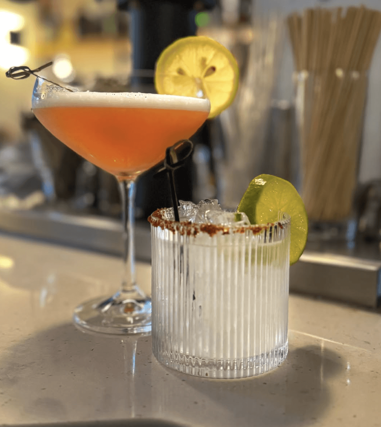 Terrace seating area with modern furniture and soft evening lighting.
