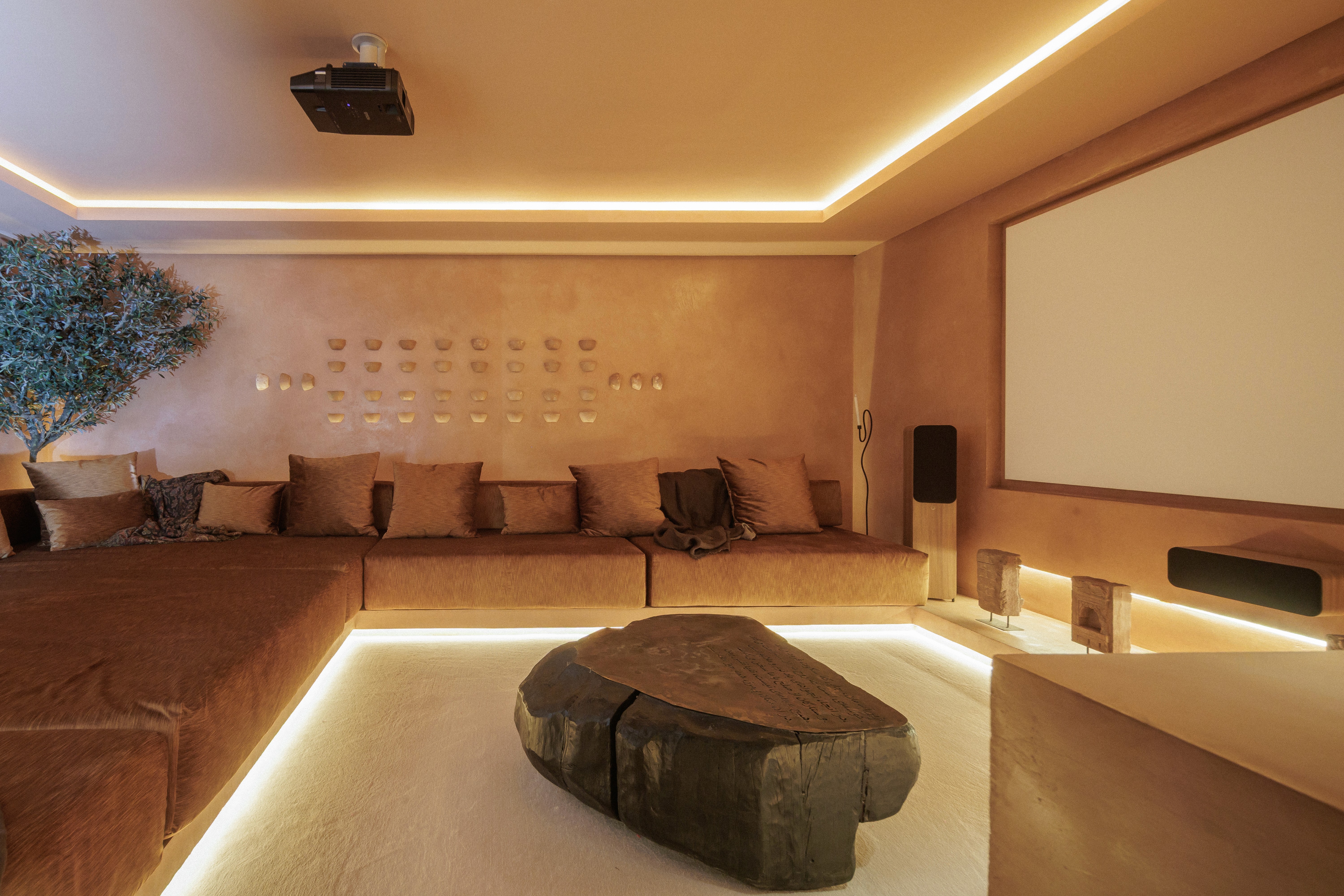 Indoor home cinema room at Casa Náyade, luxury villa renovation in Istán near Marbella by Ghara