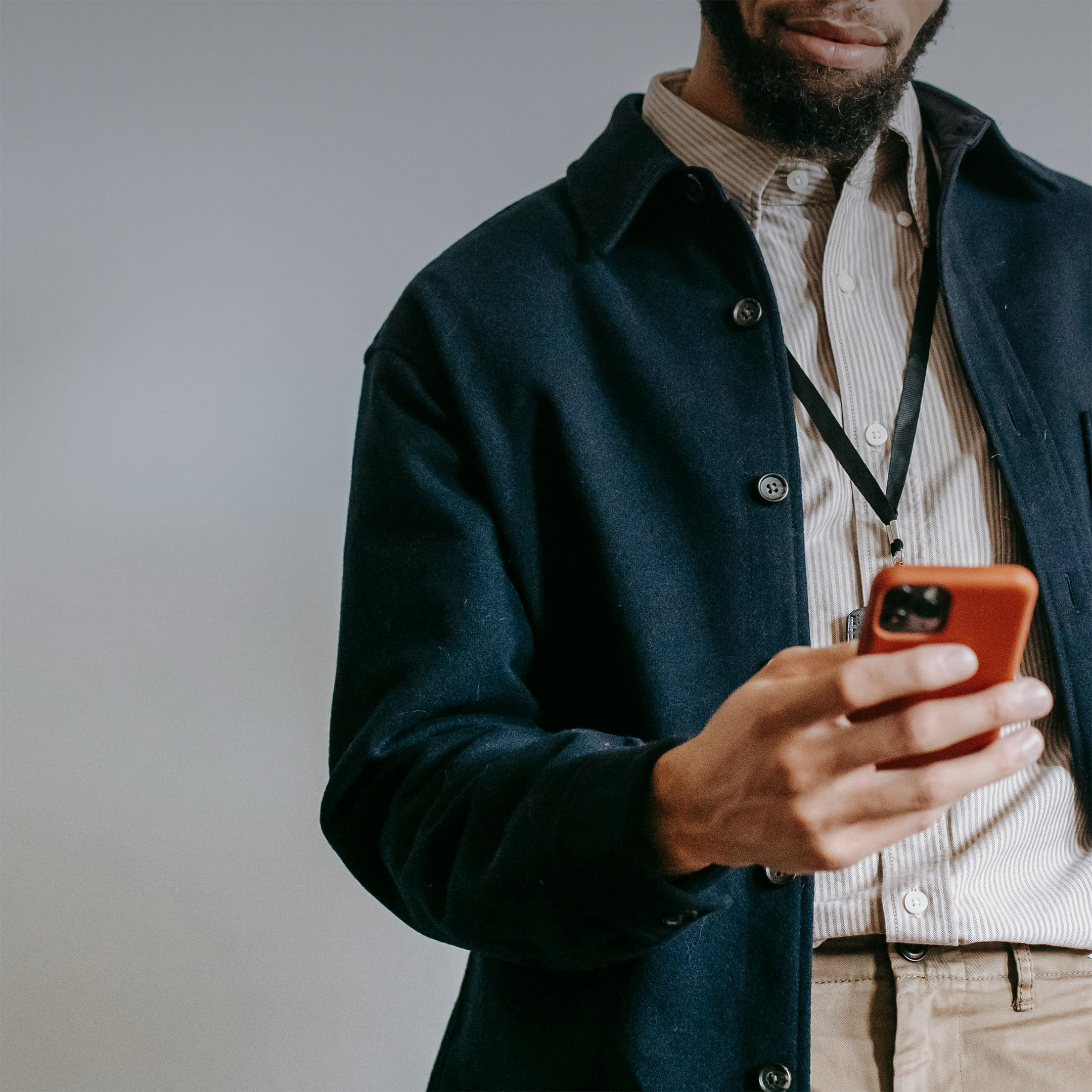 close-up with a screen with loading spinner, lying on a piece of wood