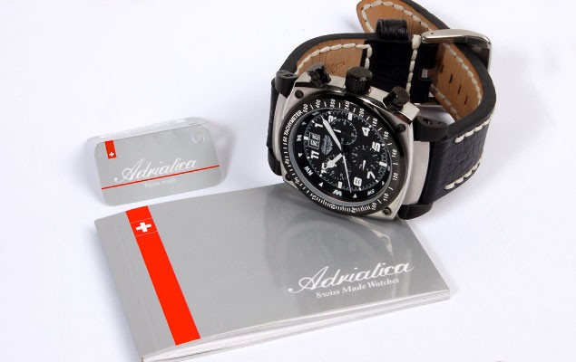 Adriatica chronograph with warranty booklet and branded hang tag – complete retail presentation set. Print identity system by Abarel.