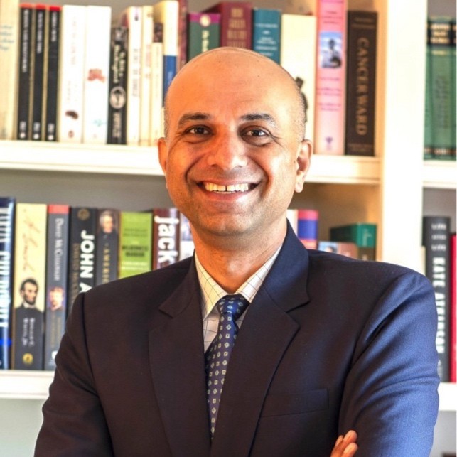 man looking at camera smiling