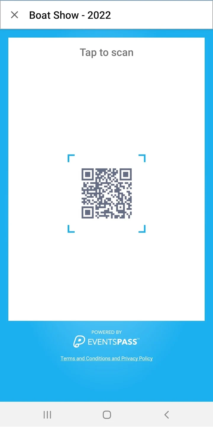 a hand holding a black device