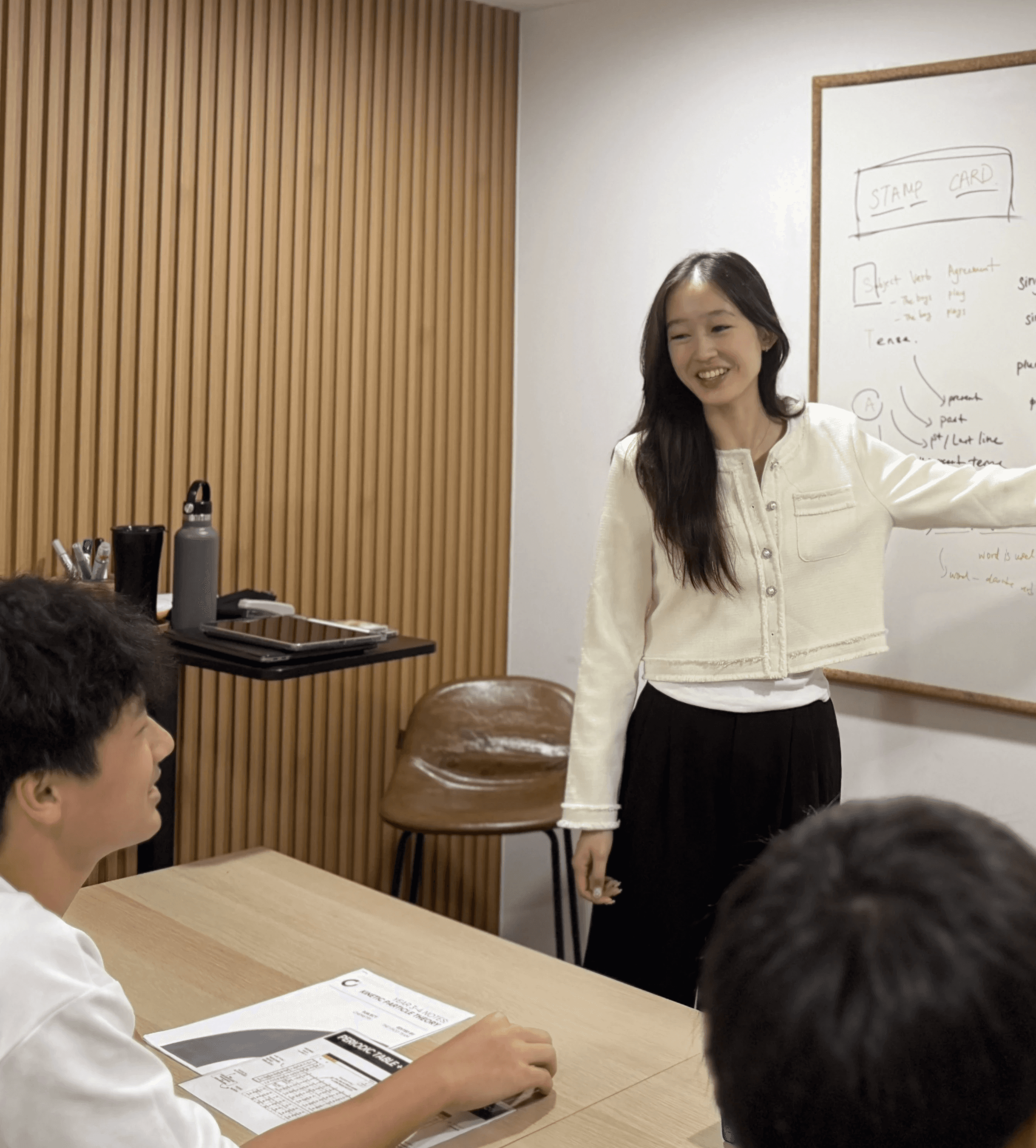 Female tutor teaching english