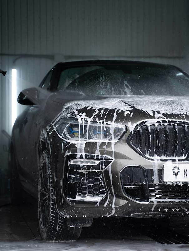 Car with soap dripping down.