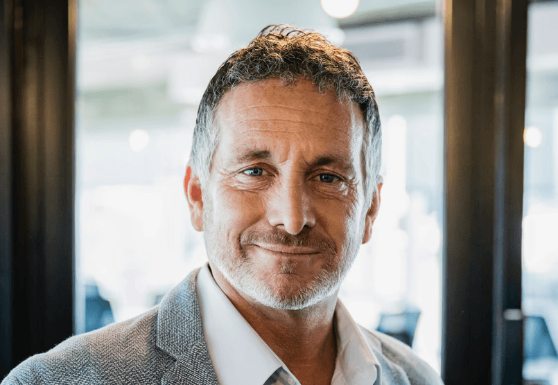 Portrait image of recently hired tech professional