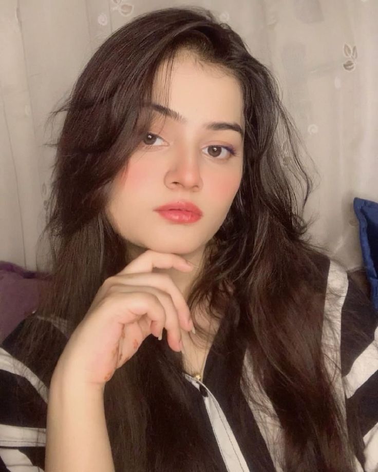 kids lying on a glass land and smiling