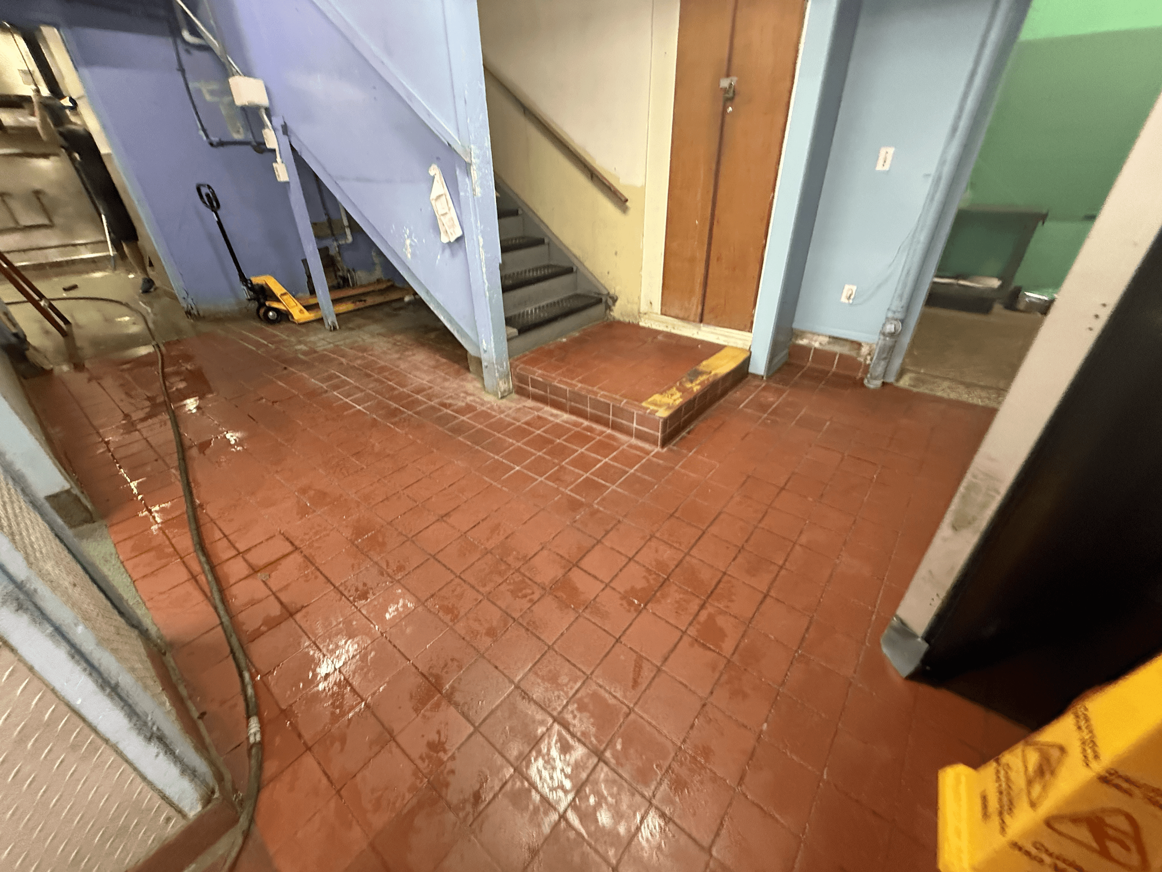 Captain Hiram’s Sebastian Florida kitchen floor before restoration