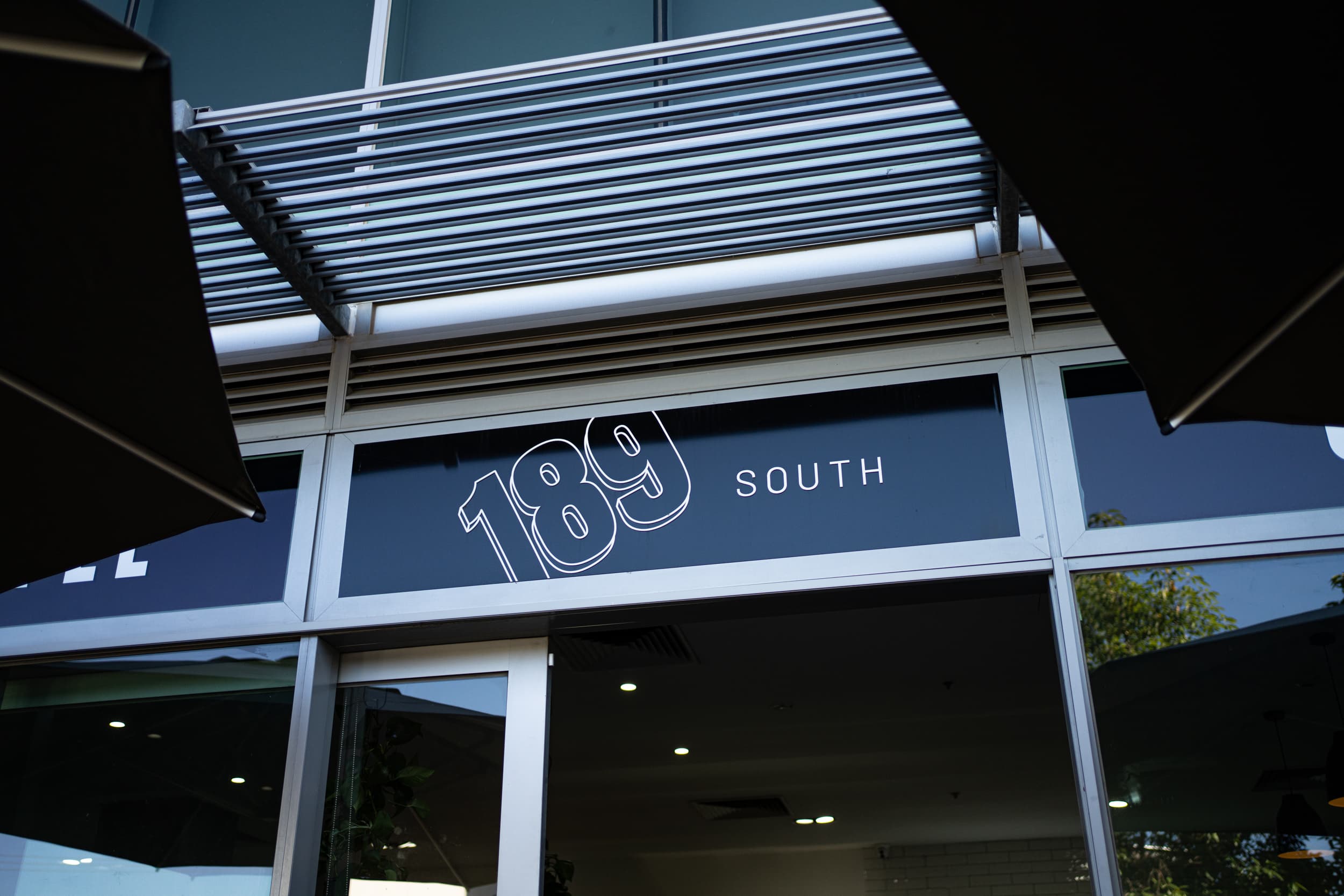 189 South cafe exterior logo signage close-up