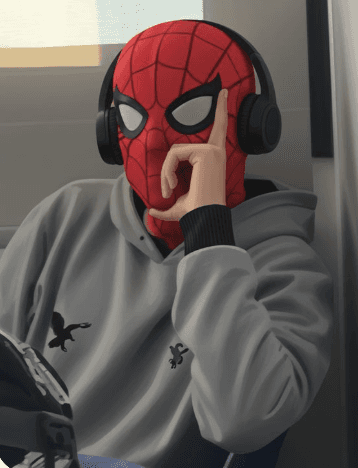 A young person with long, wavy hair sits in front of a plain background, looking directly at the camera.