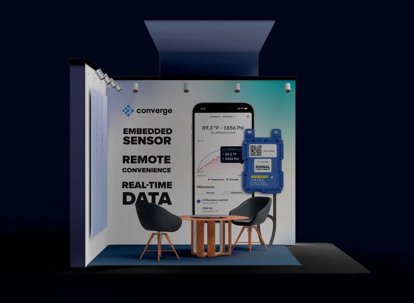 Converge trade show booth with messaging about embedded sensors and real-time concrete data, featuring product and app visuals with seating area.
