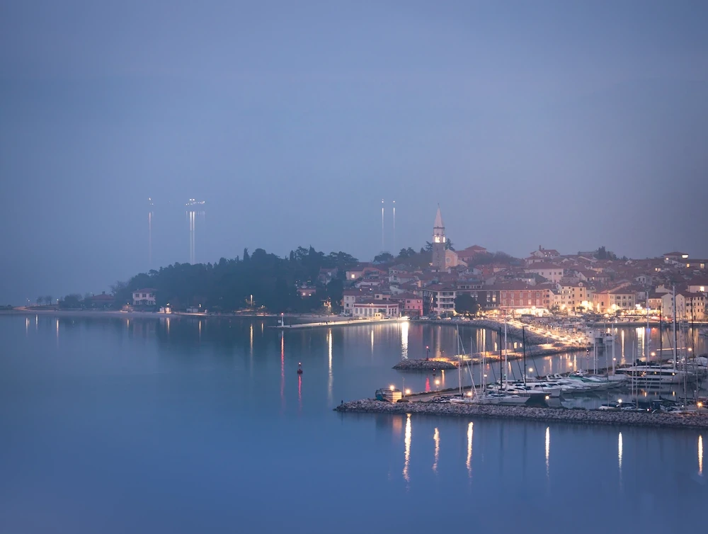 Pastel hazy evening view over Izola in Slovenian coast.