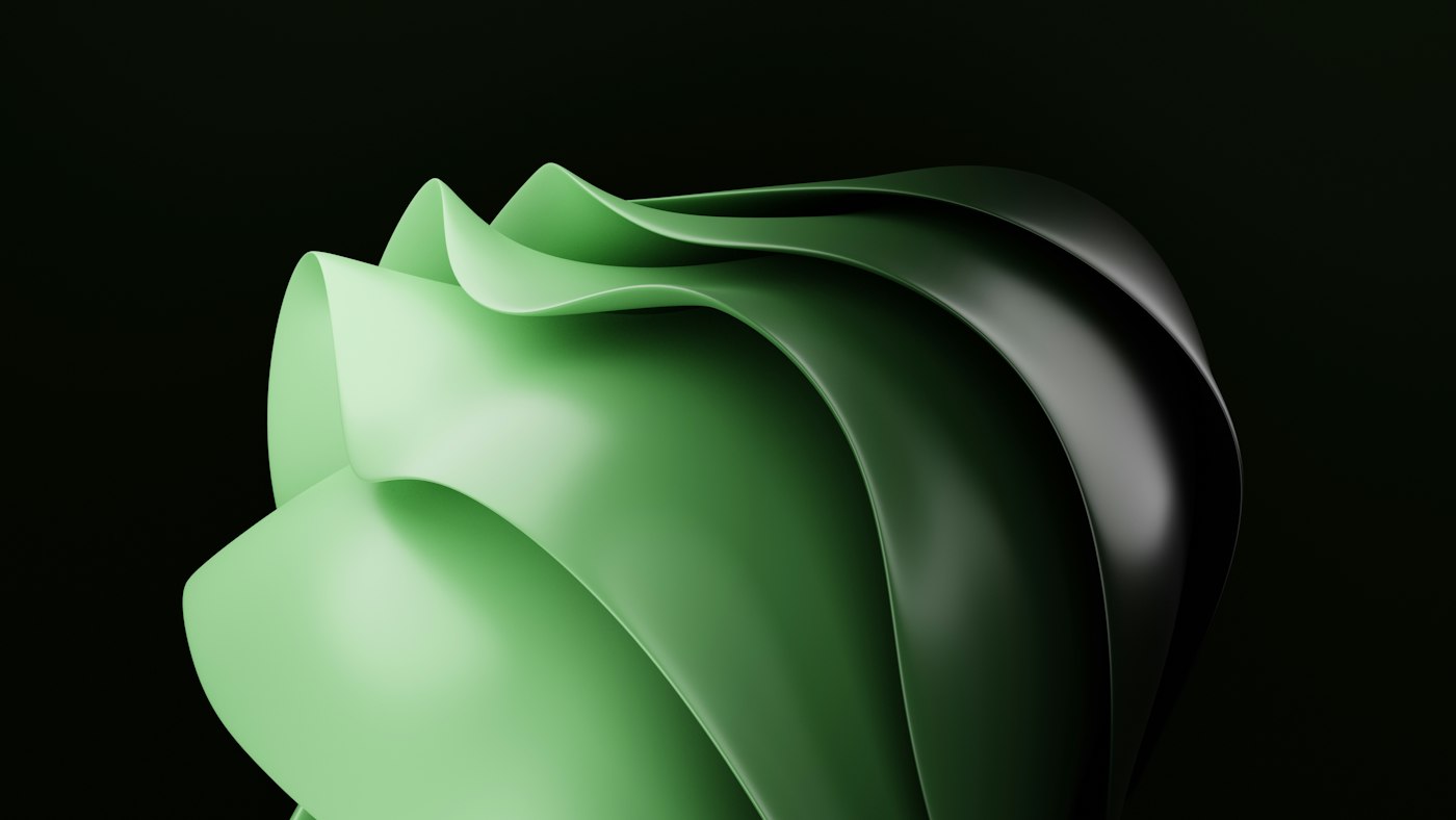 A soft green sculptural form emerging from darkness, representing a reviewed, finished result