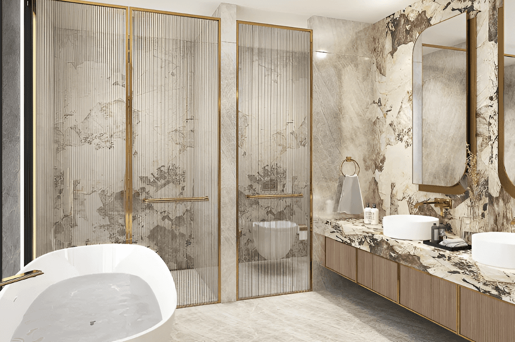  A luxurious bathroom featuring elegant marble walls and a stylish gold sink, showcasing modern design elements.
