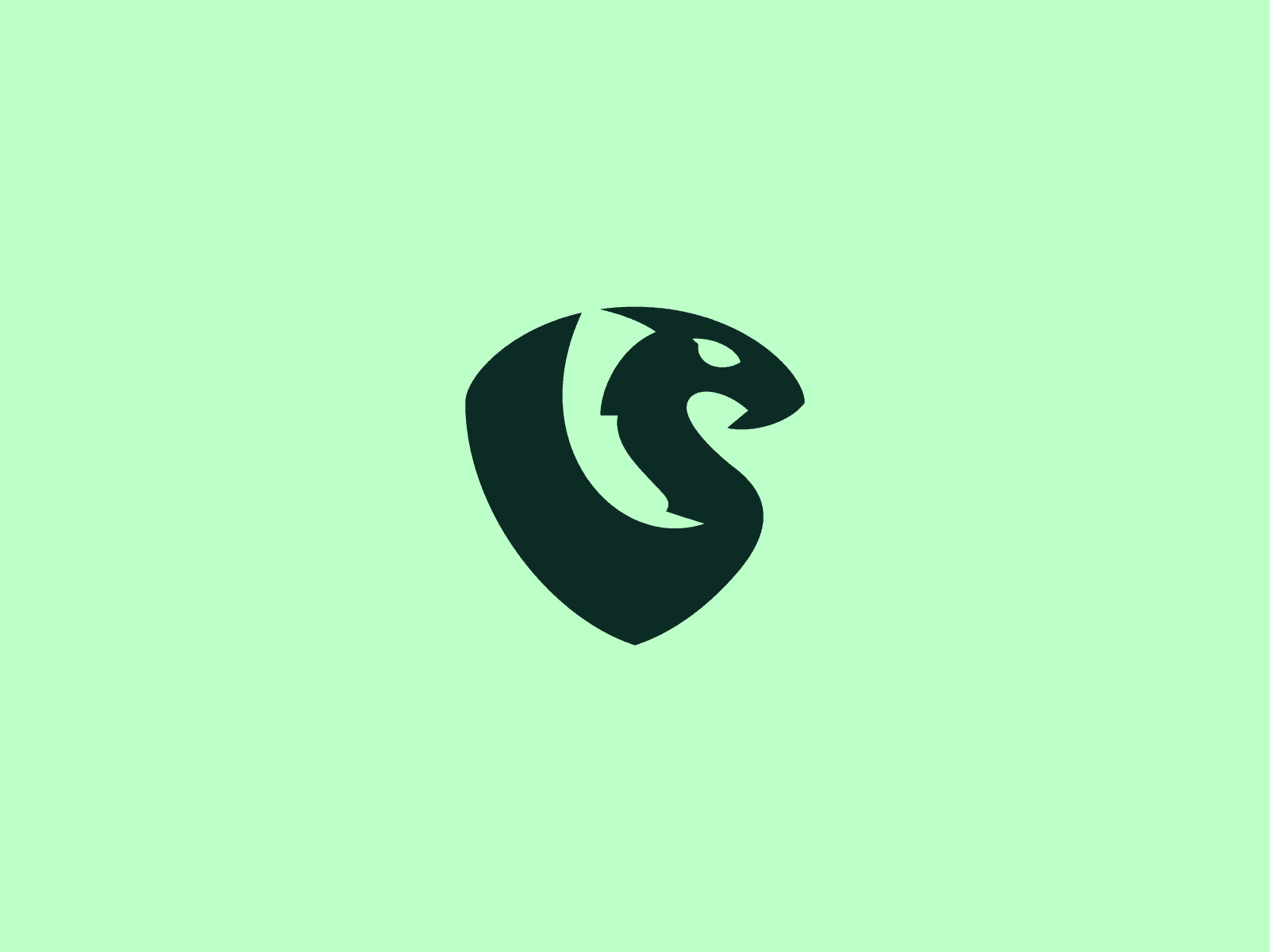 GreenDragon logo: a dark green shield with a dragon head and wing carved out, on mint