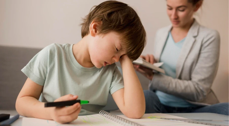 Frustrated child trying to solve some exercises in class