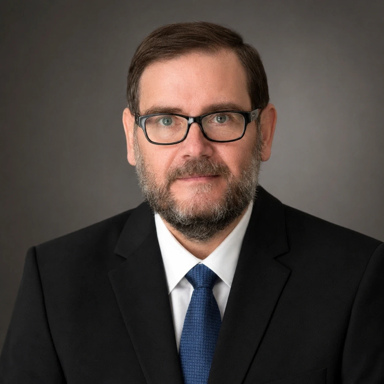 Andrew Woodcock, Board of Governance – Legal & Compliance, professional portrait for academic and professional profile