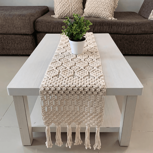 Handmade macrame table runner with thick textured weave and fringe tassels