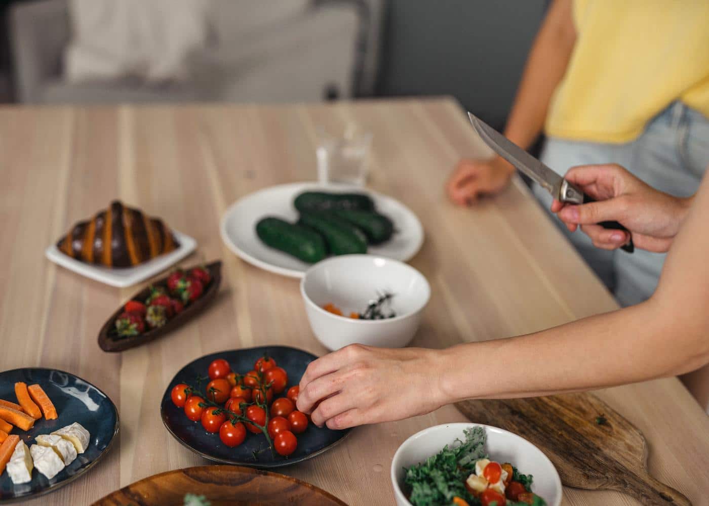 Recovery day diet: Nutrient-dense vegetables, proteins, and whole foods on a wooden table