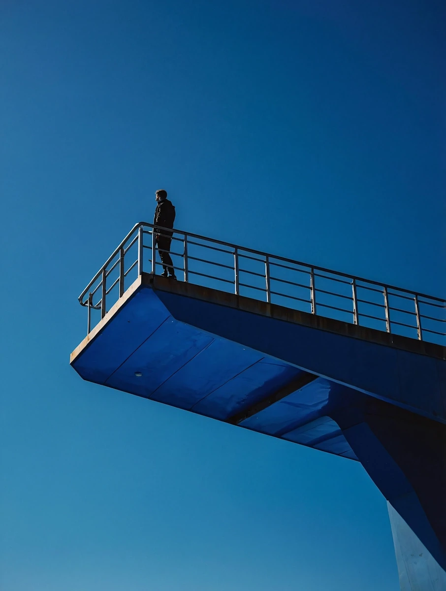 Snow-covered mountain peak illuminated by sunset light