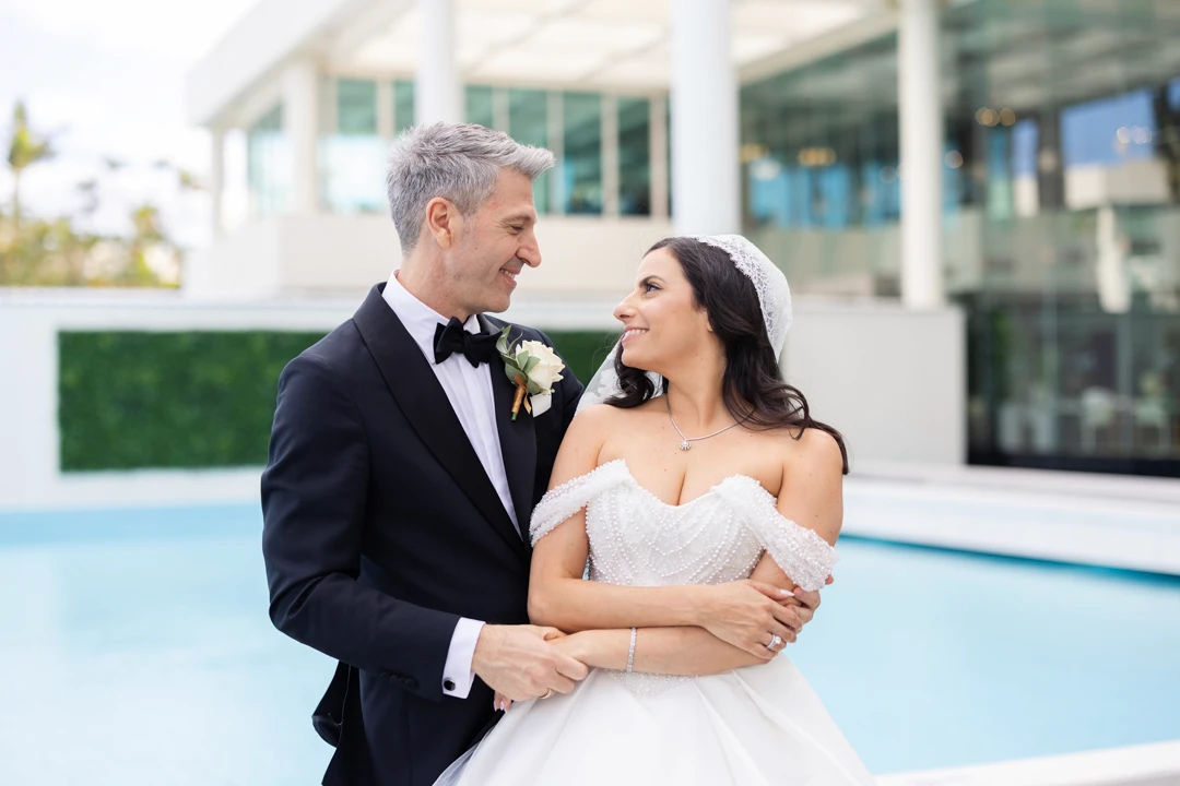 Bride and groom looking into each other's eyes