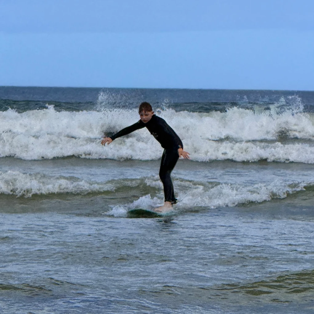 A man with Surfboard