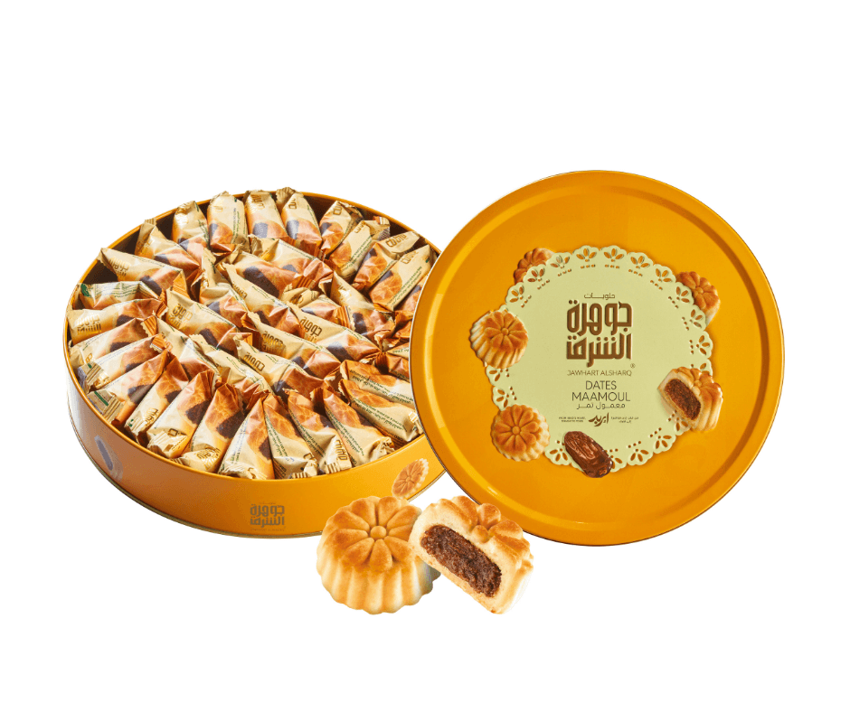 Round tin of Jawhart Al-Sharq Dates Maamoul with date-filled pastries, front view